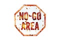 Ã¢â¬ÅNo-Go AreaÃ¢â¬Â warning sign over grungy white and red old rusty road traffic sign texture background. Royalty Free Stock Photo